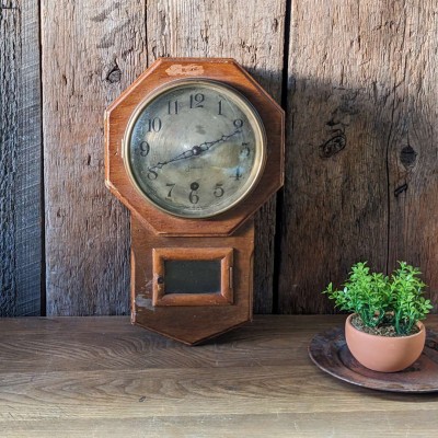 Horloge Sessions USA en bois vintage. 